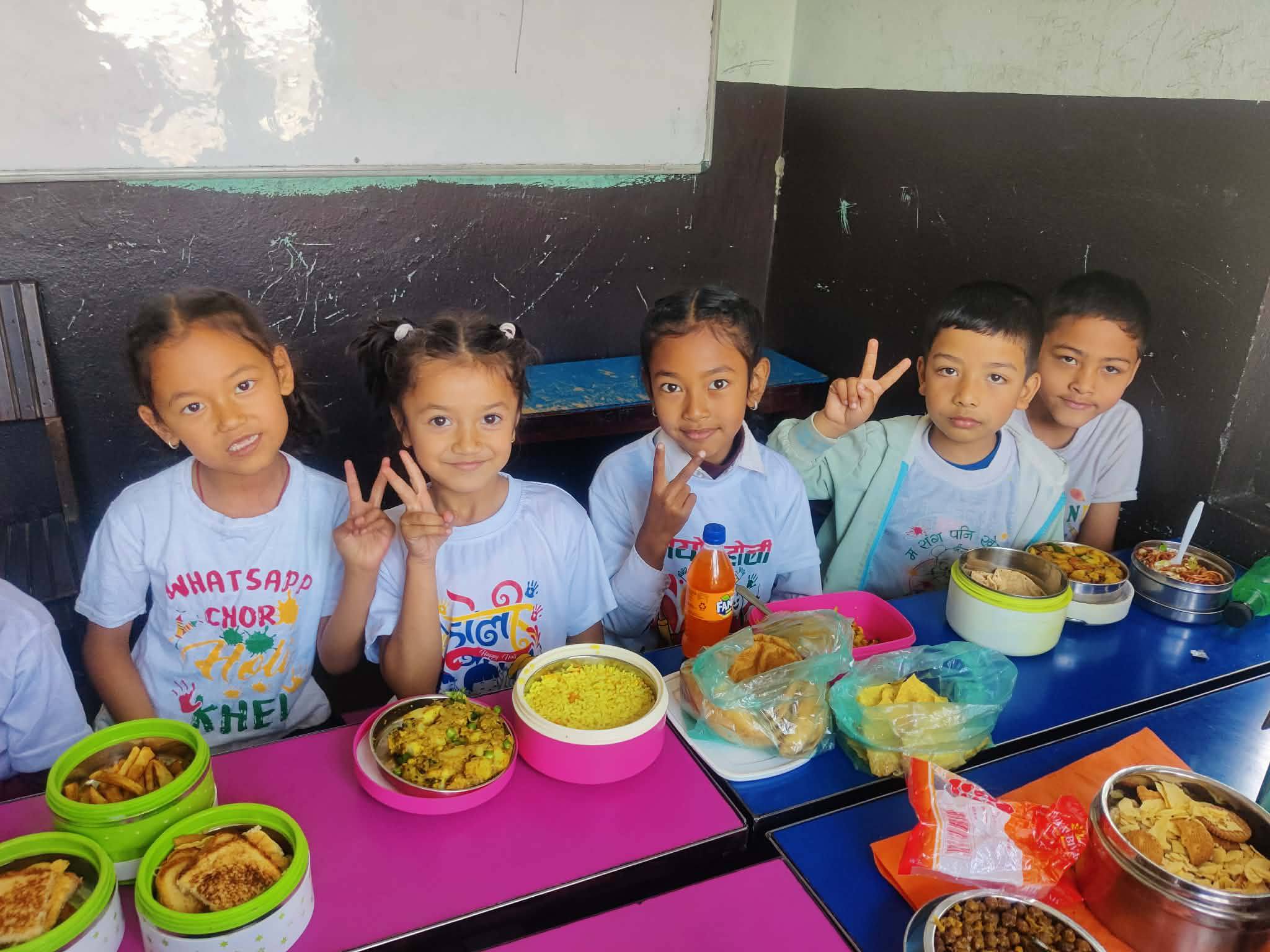Nawakunja children enjoying lunch together as a class family